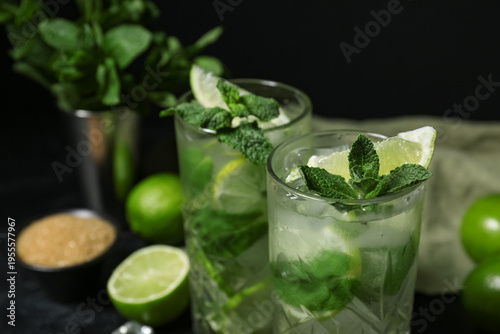 Glasses of tasty mojito on ...