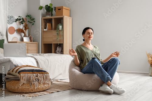 Beautiful woman with earpho...