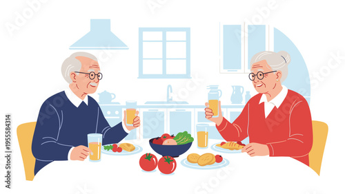 Happy elderly couple sitting at a table in the kitchen enjoying a healthy lunch together with fresh vegetables and orange juice.