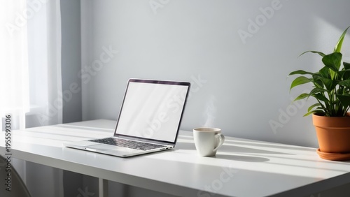 Laptop on White Desk with Coffee and Plant.
