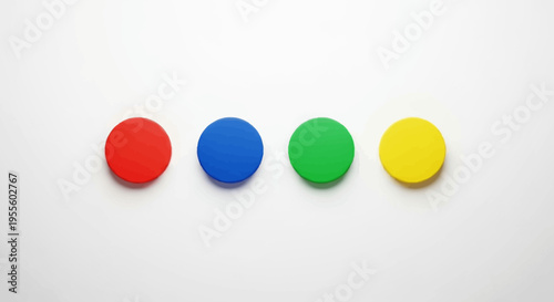 Vibrant chromatic circles arranged in a row against a pristine white backdrop