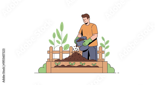 Gardener adding soil to raised garden bed with young plants