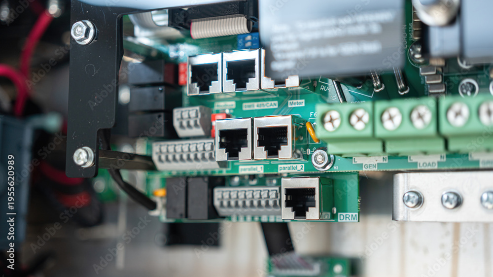 Fototapeta premium Lan connection port on the mainboard and electronic mainboard. Electrical equipmet and technology device part, close-up with selective focus.