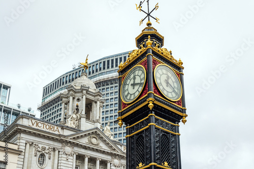 Little Ben Clock, a mini version of Big Ben, in front of Victoria Palace Theatre, Victoria Street, London, England