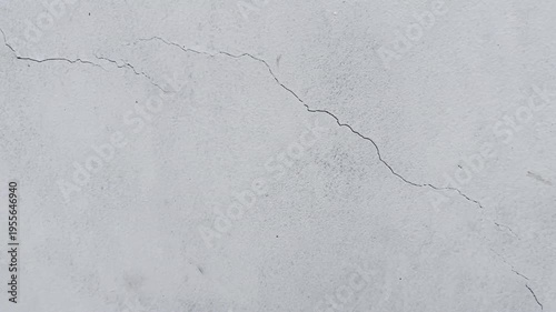 Concrete Wall With Prominent Crack Texture