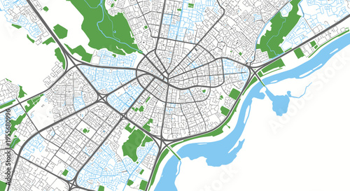 Detailed overhead map of a city with streets, buildings, river, and green parks