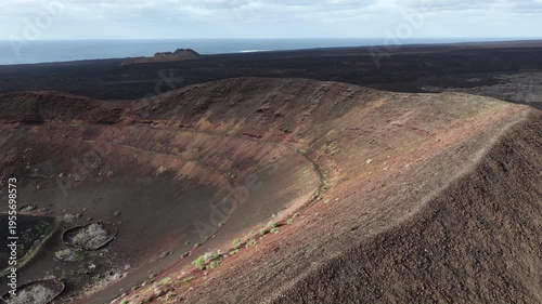 Observing Lanzarote's volcanic crater and ocean from above