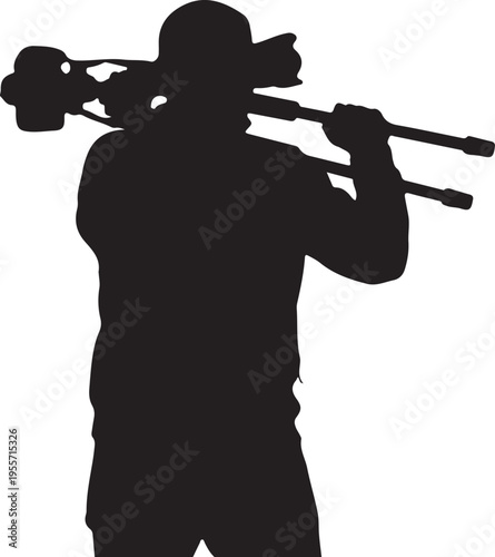 Silhouette of a person playing a tuba and holding a camera.