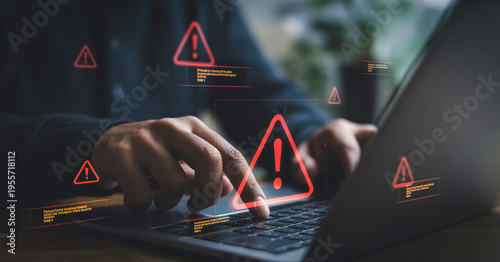 Cyber security alert warning and error on laptop screen by user