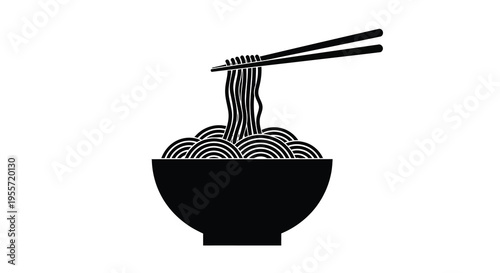 A black bowl of noodles with chopsticks a striking silhouette