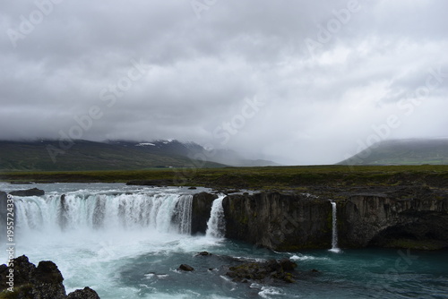 Godafoss waterfall under dramatic sky in Iceland