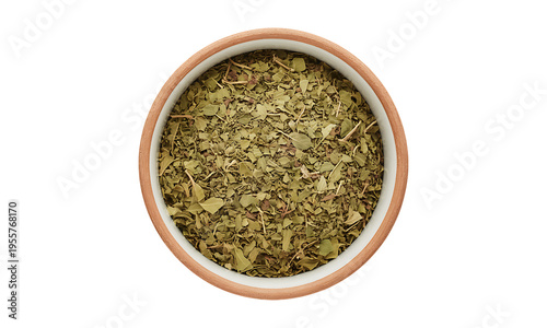 Loose leaf dried herbal tea in terracotta bowl with white rim on transparent background, top view, yerba mate or green tea