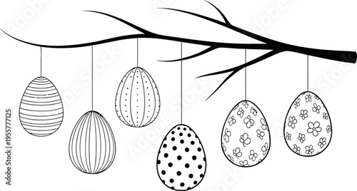 Easter eggs hanging from tree branch with patterns