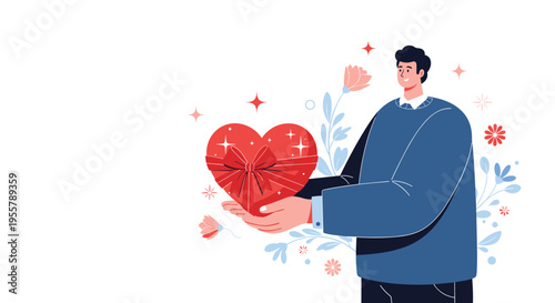 Happy man in a blue sweater holds a large red heart-shaped gift box with a ribbon bow against a decorative floral background.