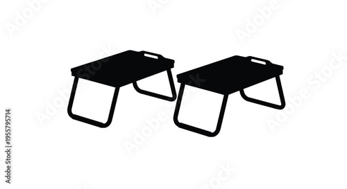Two black folding tv trays depicted in a stark silhouette