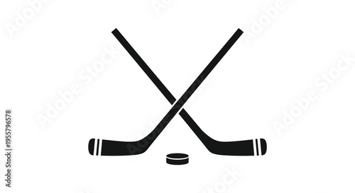Two crossed hockey sticks and a puck a striking black silhouette