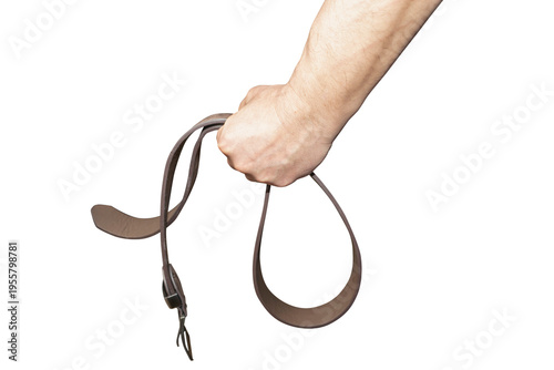 Male hands holding leather pant strap belt