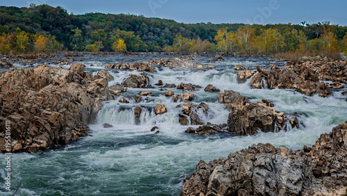 The Potomac River cascades over large rocks.