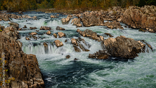 Majestic Potomac River rapids cascade over rugged rocks in a powerful natural display