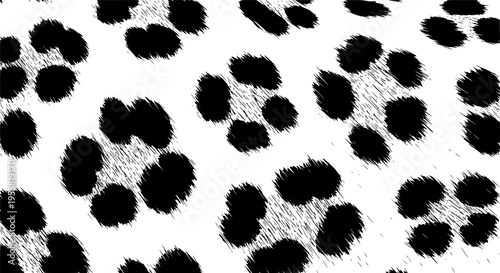 Close-up of black spots on a white textured surface resembling animal fur pattern