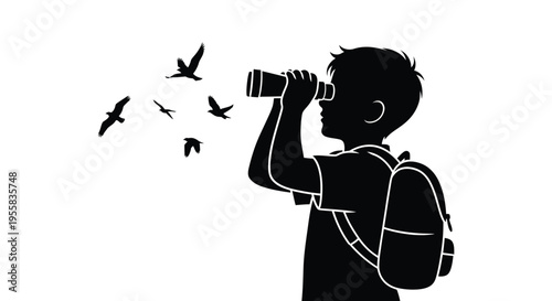 Boy observing birds through binoculars a striking black silhouette