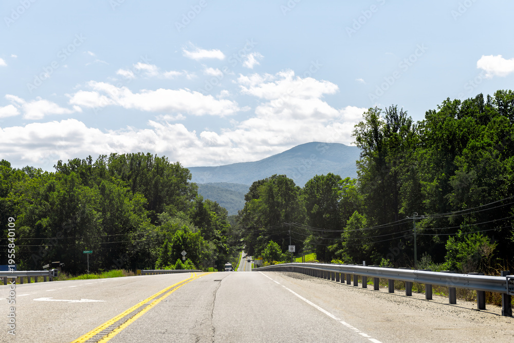 Obraz premium Blue ridge mountains in Nelson county by Afton town, Virginia with road highway view in green summer landscape scenery