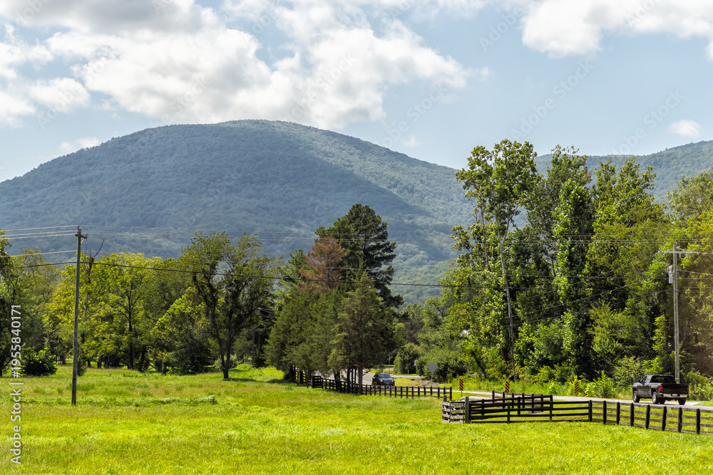 Fototapeta premium Blue ridge mountains in Nelson county by Afton town, Virginia with scenic countryside road highway view in green summer landscape scenery