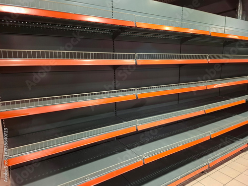 A supermarket faces empty shelves and product scarcity