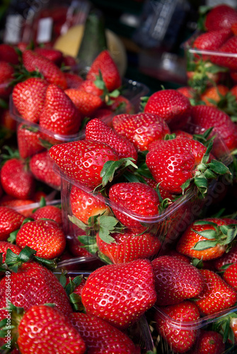 Fresh Strawberries in Plastic Containers at Market