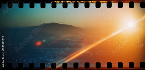 Vintage Film Strip Sunset Over Mountain Landscape with Lens Flare.