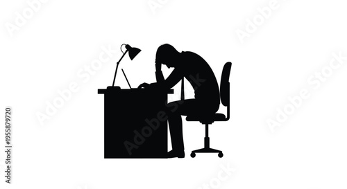 A person overwhelmed and stressed while working at a desk silhouette