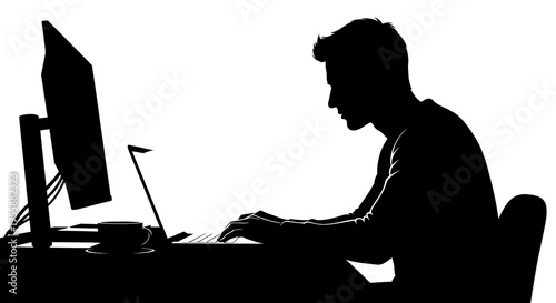Silhouette of a man working on a laptop and computer at a desk