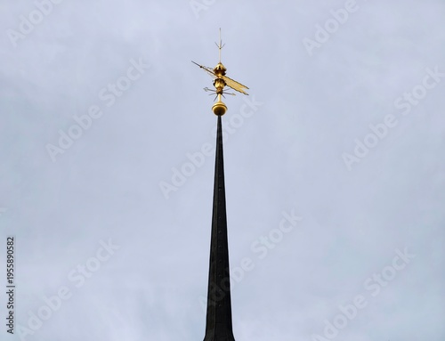 Canvastavla Bright steeple amid storm clouds