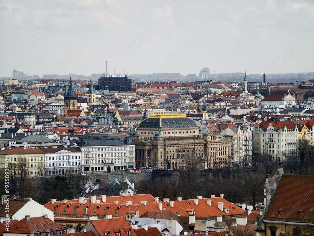 Obraz premium Old town skyline with churches. Panoramic scene of aged city with church spires and modern horizon
