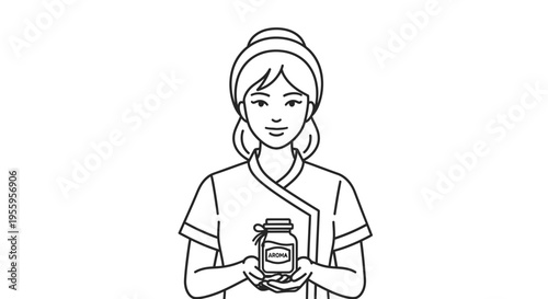Spa Therapist Holding Aromatherapy Essential Oil Bottle