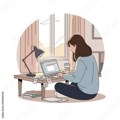 A young woman sitting on the floor working on her laptop in a cozy room by the window