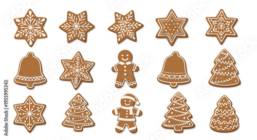Assorted collection of traditional Christmas gingerbread cookies in shapes of stars bells trees and gingerbread men figures.