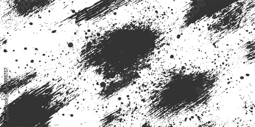 Abstract a collection of monochrome ink stains and paint splatter marks that create dynamic and irregular texture. Ideal for artistic design elements, or adding visual interest to graphic projects.