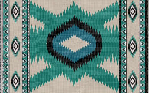A teal and beige woven rug with geometric diamond patterns