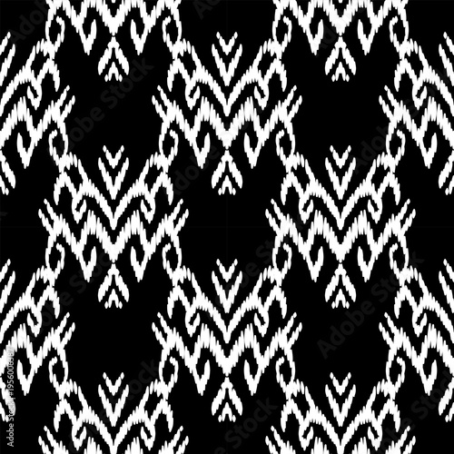 "A hand-crafted seamless pattern inspired by traditional Ikat and tribal textiles. The design features intricate damask-style motifs drawn with intentional organic strokes to create a natural, woven t