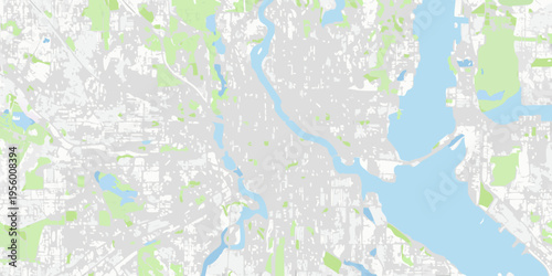 Aerial view of a city and river landscape with green spaces