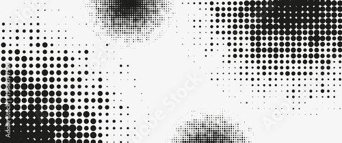 Abstract black halftone dot pattern on white background, monochrome pop art vector texture for minimalist banner, retro comic style, and modern industrial graphic design