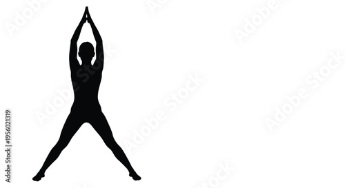 Silhouette of a person standing in a yoga pose with arms raised overhead and legs spread wide