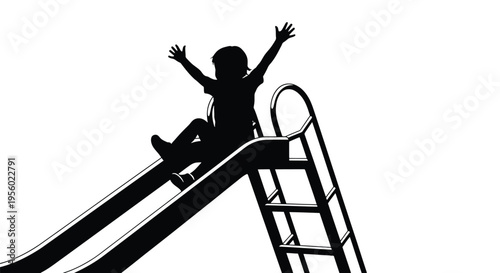 Silhouette of a happy child sliding down a playground slide with arms raised
