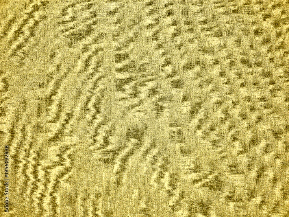Naklejka premium Gold colored linen texture wall for background.