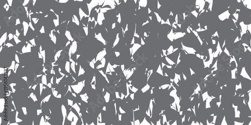 A chaotic abstract pattern featuring overlapping gray shapes against a crisp white background base