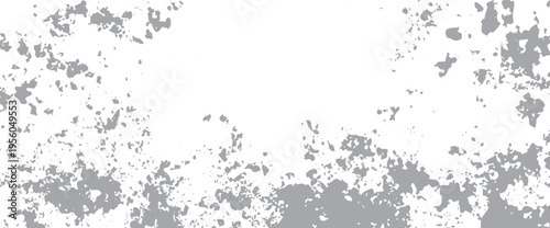Grey and white abstract grunge texture with scattered paint splatter patterns