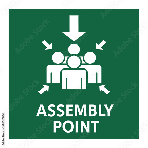 A green square safety sign indicating an assembly point with white icons of people and arrows for emergency evacuation.