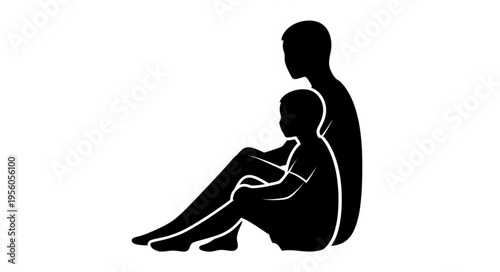 Silhouette of a Father and Son Sitting Together.