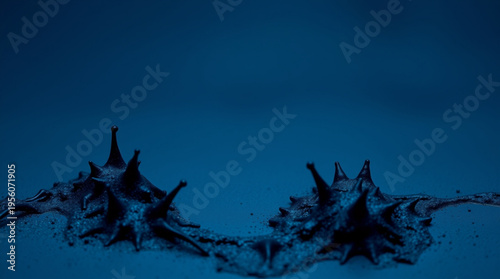 Clusters of black spiky structures resembling virus models arranged on a deep blue background, featuring rough textures
